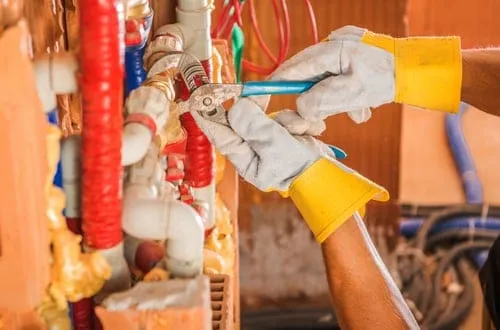 Professional plumber from Best Quality Plumbing Services at work in Sylmar, CA